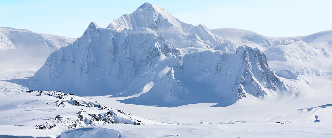 Photo of a snowy mountain