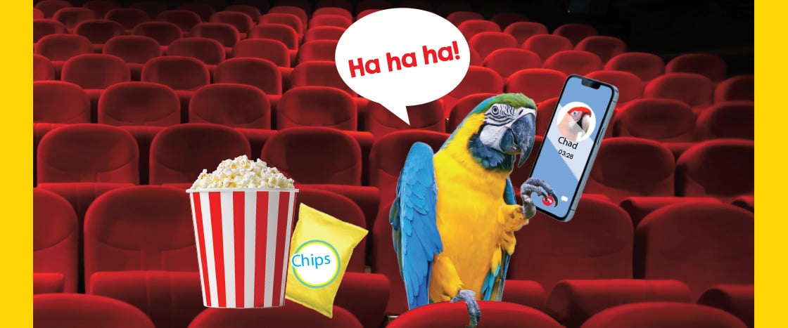 Image of parrot talking on phone with their phone in the movie theatre