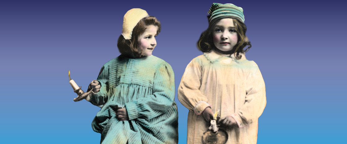 Black & white photo of kids wearing night gowns