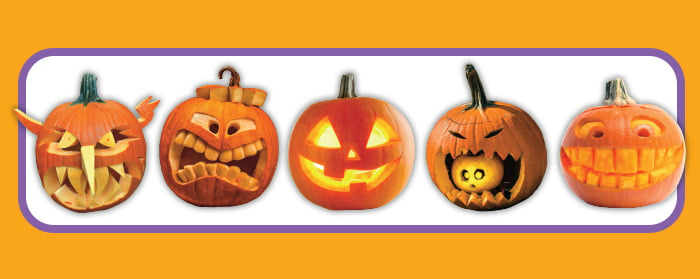 Five carved Halloween jack-o-lanterns with different face designs, one lit from within